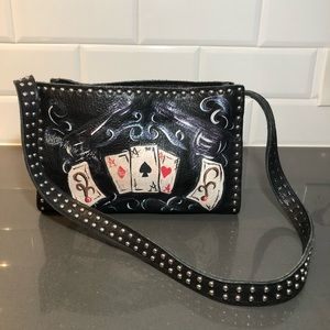 Genuine leather studded bag with pistols and cards